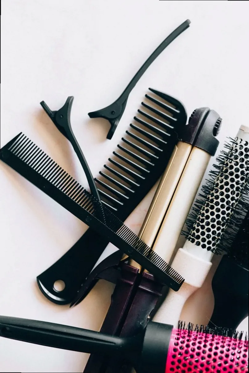 A collection of essential hairdressing tools and accessories for salon use.
